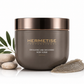 Hermetise Professional Exfoliating and Smoothing Body Scrub jar with olive branch and stone on white background