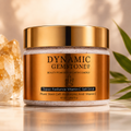 Dynamic Gemstone Topaz Radiance Vitamin C Salt Scrub open jar on marble with white roses and candle