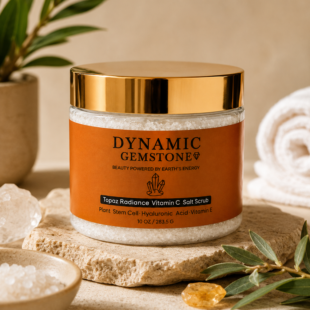 Dynamic Gemstone Topaz Radiance Vitamin C Salt Scrub jar on stone with topaz crystals and botanicals