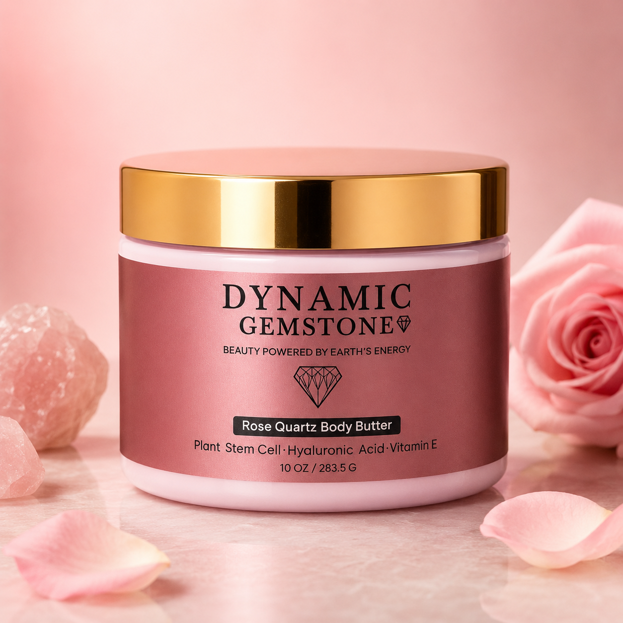 Dynamic Gemstone Rose Quartz Body Butter 10oz jar with gold lid surrounded by pink roses and rose quartz crystals