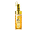 Prédiré Paris 24-Hour Hydrating Lava Foam Facial Cleanser - gold bottle with built-in brush head on white background