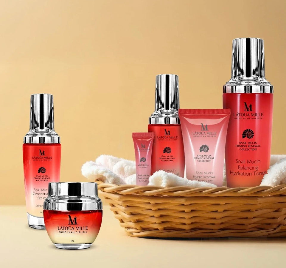 Latoua Millé Snail Mucin Firming Renewal Collection - 6 products in wicker basket on warm beige background