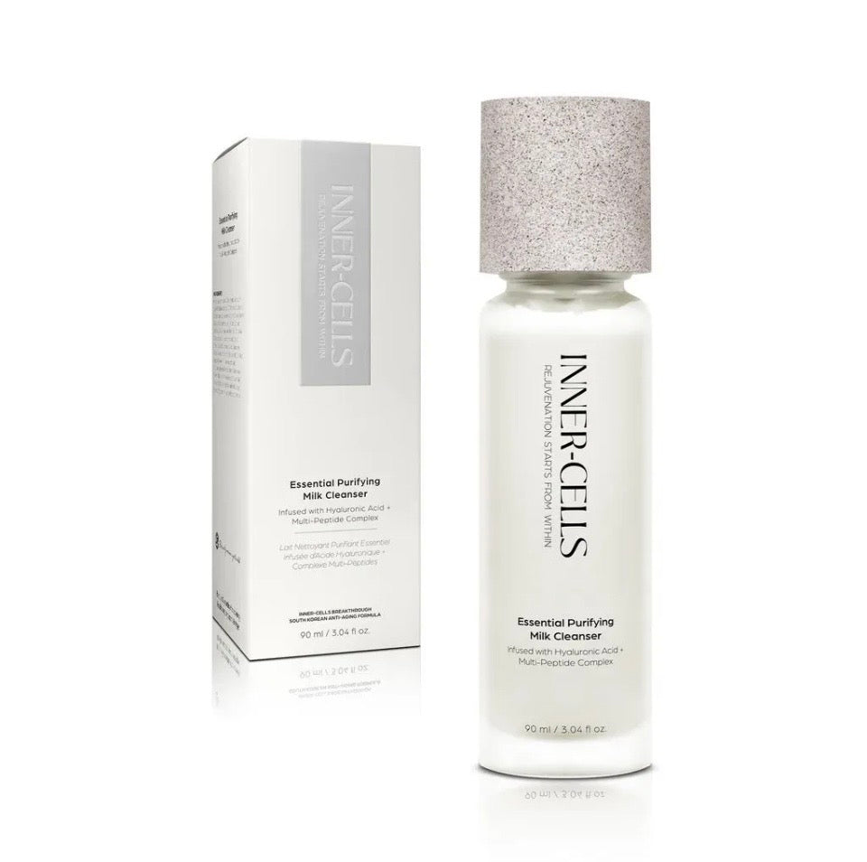 Inner-Cells Essential Purifying Milk Cleanser - white frosted bottle with speckled granite cap next to white gift box on white background