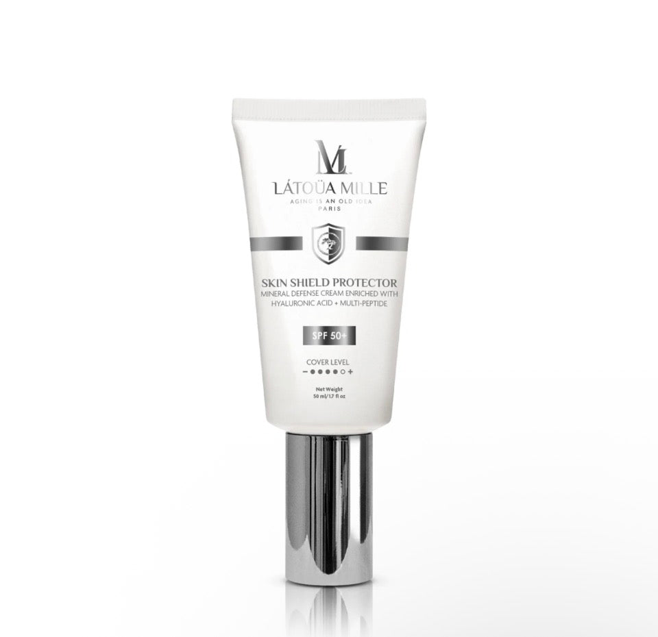 Látoüa Mille Skin Shield Protector SPF 50+ - white tube with chrome base solo on white background showing SPF 50+ and Cover Level indicators