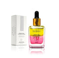 Inner-Cells Precision C Glow Dual-Essence Oil Serum - chartreuse-yellow and hot-pink dual-phase glass bottle with gold collar next to white Inner-Cells gift box