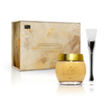 Secret Collagen Firming & Tightening Peeling Mask - champagne-gold amber glass jar with gold lid and chrome silicone brush next to champagne-gold marble gift box with gold wax seal