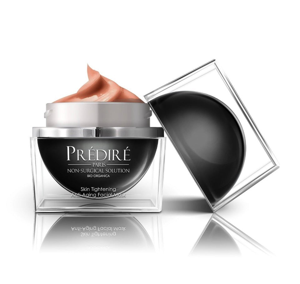 Prédiré Paris Bio Organica Skin Tightening Anti-Aging Facial Mask - open jar showing warm rose-beige cream with spherical dome lid leaning against acrylic case