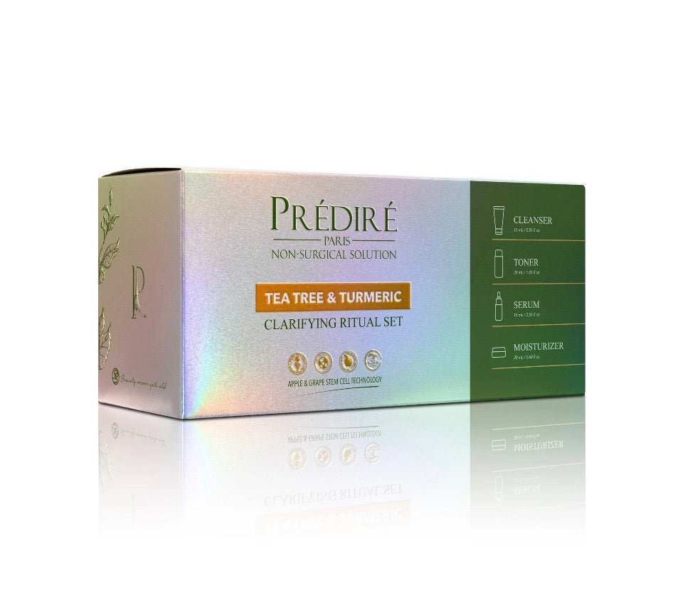 Prédiré Paris Tea Tree & Turmeric Clarifying Ritual Set - holographic iridescent gift box solo showing gold botanical illustration and amber Tea Tree & Turmeric badge