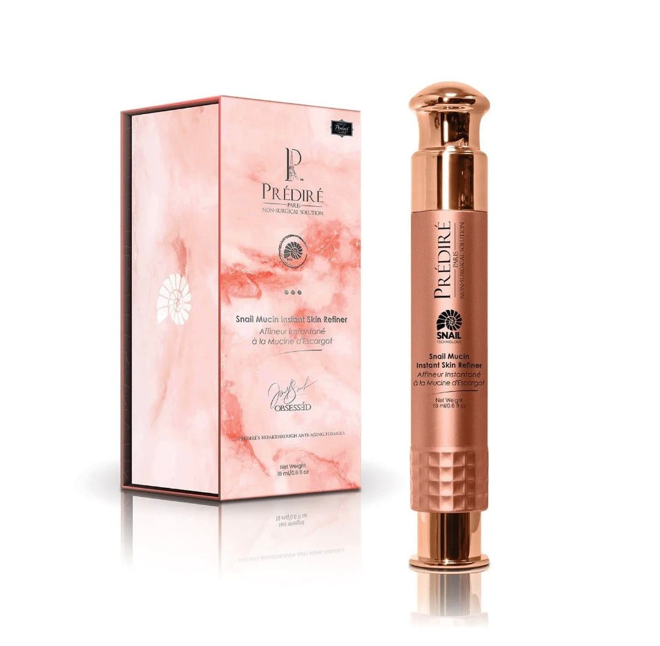 Prédiré Paris Snail Mucin Instant Skin Refiner - rose-gold airless pump pen next to blush-pink marble gift box on white background