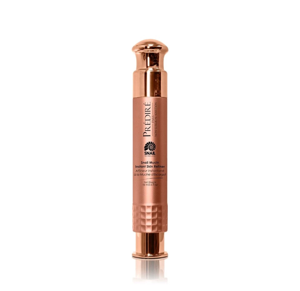 Prédiré Paris Snail Mucin Instant Skin Refiner - rose-gold all-metal airless pump pen solo on white background showing diamond-quilted base and Prédiré P monogram